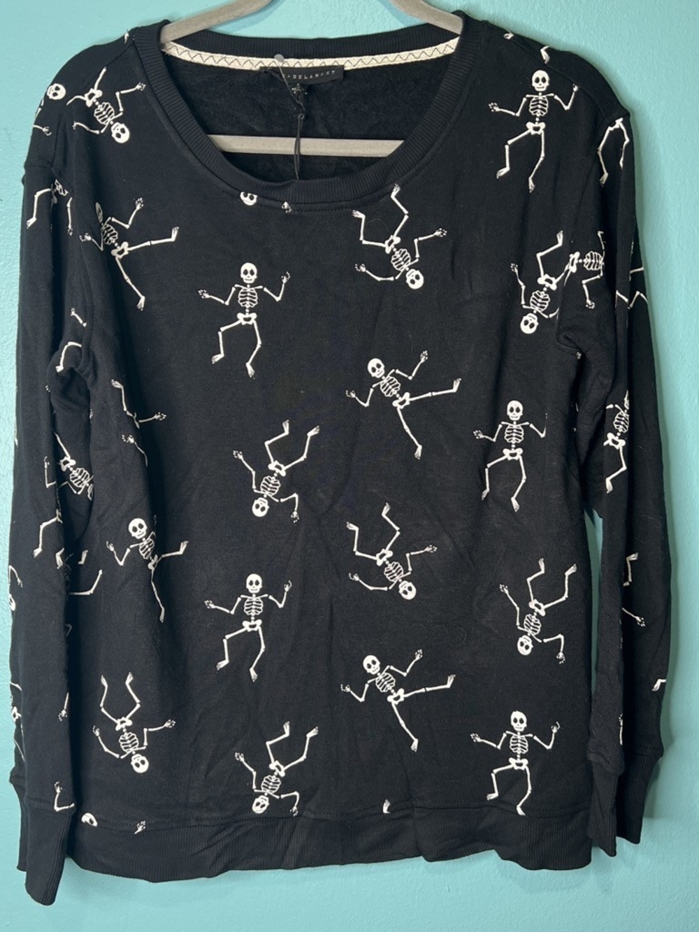 Jane + Delancy Black Skeleton Print Long-Sleeve Top